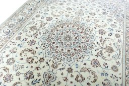 Backside of handmade 2000s Nain rug showing knot structure and weave density
