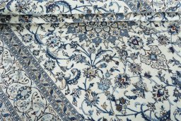 Close-up detail of 2000s Nain rug from Iran / Persia showing Wool weave