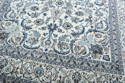 Close-up detail of 2000s Nain rug from Iran / Persia showing Wool weave