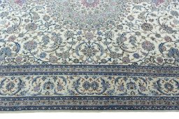 Corner detail of 2000s Nain rug showing border pattern and Cork pile