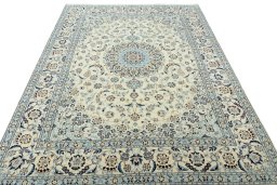 Surface texture of 2000s Nain rug with natural Wool and intricate pattern