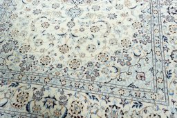 Close-up detail of 2000s Nain rug from Iran / Persia showing Wool weave