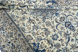 Close-up detail of 2000s Nain rug from Iran / Persia showing Wool weave