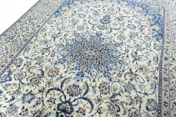 Backside of handmade 2000s Nain rug showing knot structure and weave density