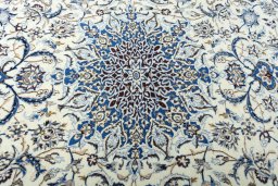 Central medallion detail of 2000s Nain rug from Iran / Persia