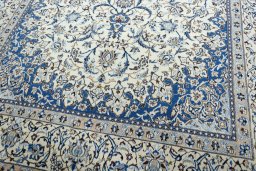 Close-up detail of 2000s Nain rug from Iran / Persia showing Wool weave