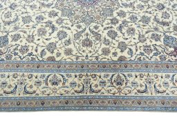 Corner detail of 2000s Nain rug showing border pattern and Cork pile