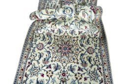 Close-up detail of 2000s Nain rug from Iran / Persia showing Wool weave