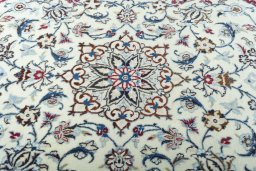 Central medallion detail of 2000s Nain rug from Iran / Persia
