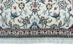 Close-up detail of 2000s Nain rug from Iran / Persia showing Wool weave