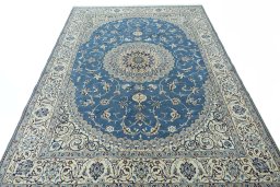 Surface texture of 2000s Nain rug with natural Wool and intricate pattern
