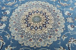 Central medallion detail of 2000s Nain rug from Iran / Persia