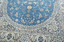 Close-up detail of 2000s Nain rug from Iran / Persia showing Wool weave