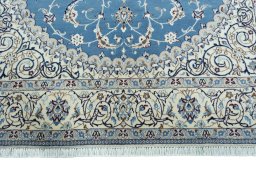 Full view of 2000s Nain rug from Iran / Persia, 301 × 196 cm in Blue tones