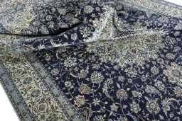 Surface texture of 2000s Nain rug with natural Cork and intricate pattern