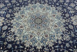 Central medallion detail of 2000s Nain rug from Iran / Persia