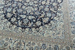 Close-up detail of 2000s Nain rug from Iran / Persia showing Wool weave