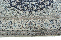 Full view of 2000s Nain rug from Iran / Persia, 318 × 224 cm in Blue tones