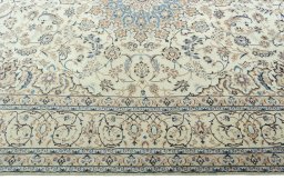 Corner detail of 2000s Nain rug showing border pattern and Wool pile