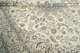Close-up detail of 2000s Nain rug from Iran / Persia showing Wool weave