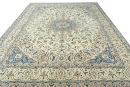 Surface texture of 2000s Nain rug with natural Wool and intricate pattern