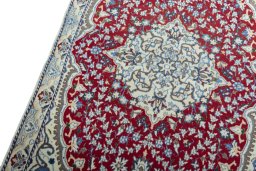 Backside of handmade 2000s Nain rug showing knot structure and weave density