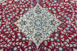 Central medallion detail of 2000s Nain rug from Iran / Persia