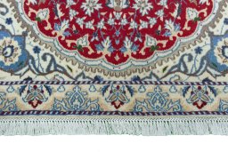 Close-up detail of 2000s Nain rug from Iran / Persia showing Wool weave