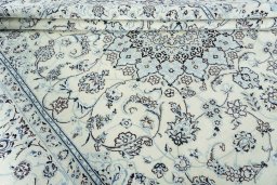 Close-up detail of New Nain rug from Iran / Persia showing Wool weave