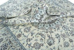 Surface texture of New Nain rug with natural Wool and intricate pattern