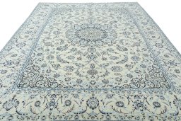 Surface texture of New Nain rug with natural Wool and intricate pattern