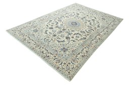 Corner detail of 2000s Nain rug showing border pattern and Wool pile