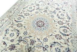 Backside of handmade 2000s Nain rug showing knot structure and weave density