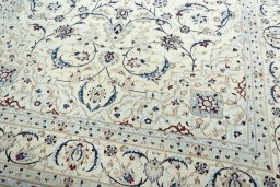 Close-up detail of 2000s Nain rug from Iran / Persia showing Wool weave