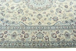 Corner detail of New Nain rug showing border pattern and Wool pile
