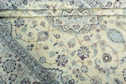 Close-up detail of New Nain rug from Iran / Persia showing Wool weave