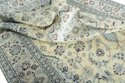 Surface texture of New Nain rug with natural Wool and intricate pattern