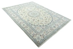 Close-up detail of New Nain rug from Iran / Persia showing Wool weave