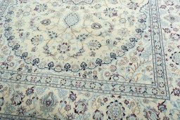 Close-up detail of New Nain rug from Iran / Persia showing Wool weave