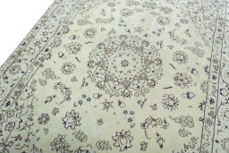 Backside of handmade 2000s Nain rug showing knot structure and weave density