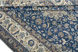 Close-up detail of 2000s Nain rug from Iran / Persia showing Wool weave