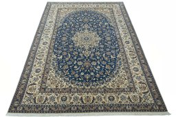 Surface texture of 2000s Nain rug with natural Wool and intricate pattern