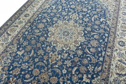 Backside of handmade 2000s Nain rug showing knot structure and weave density