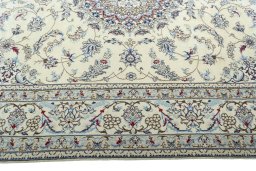 Corner detail of 2000s Nain rug showing border pattern and Wool pile