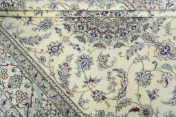 Close-up detail of 2000s Nain rug from Iran / Persia showing Wool weave