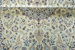 Close-up detail of 2000s Nain rug from Iran / Persia showing Wool weave