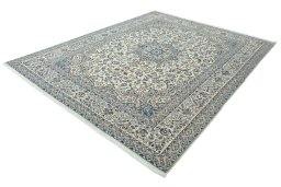 Corner detail of 2000s Nain rug showing border pattern and Wool pile