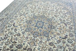 Backside of handmade 2000s Nain rug showing knot structure and weave density