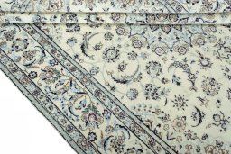 Close-up detail of 2000s Nain rug from Iran / Persia showing Wool weave