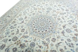 Backside of handmade New Nain rug showing knot structure and weave density